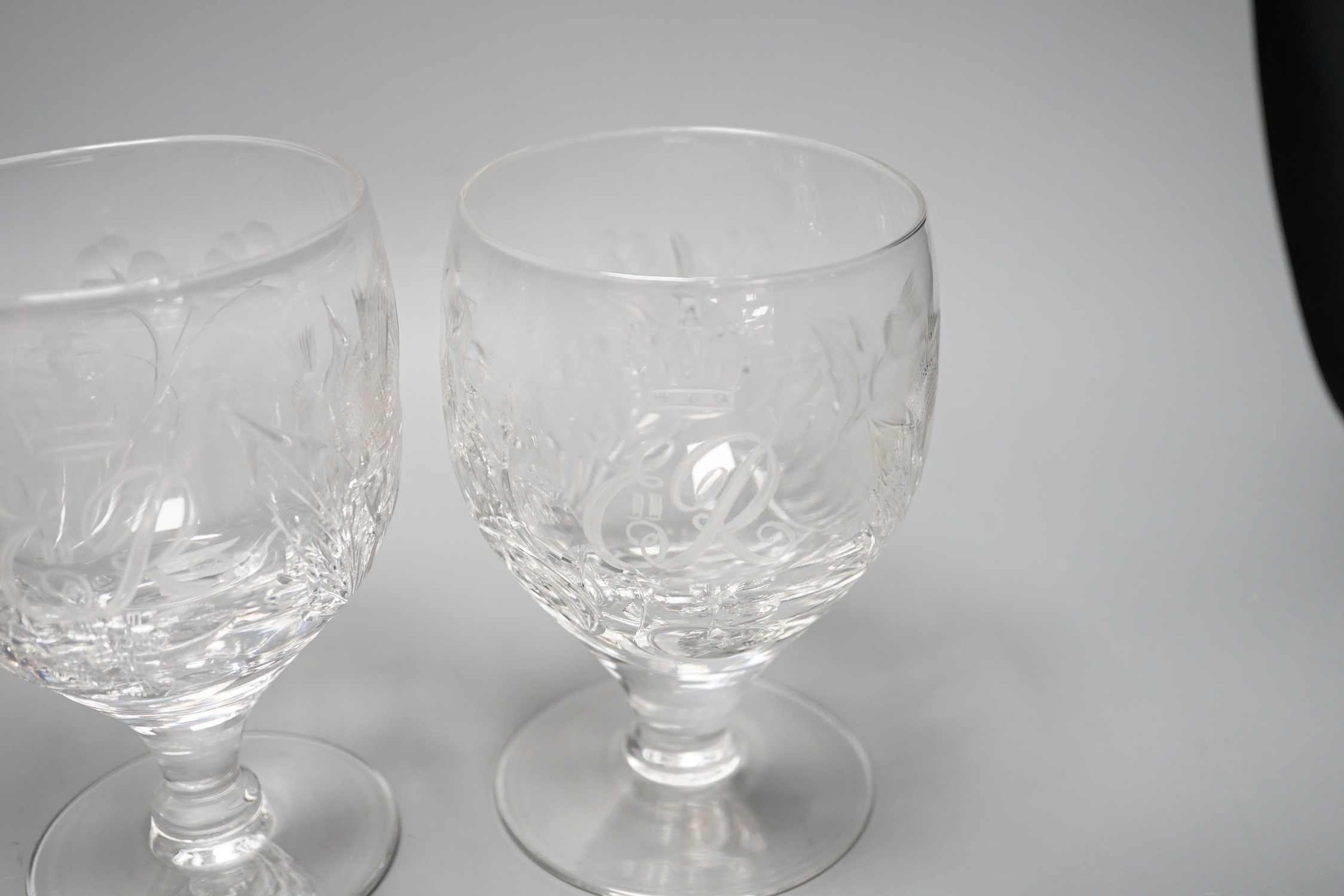 A set of four commemorative 1953 ER II coronation etched wine goblets, 14cms high
